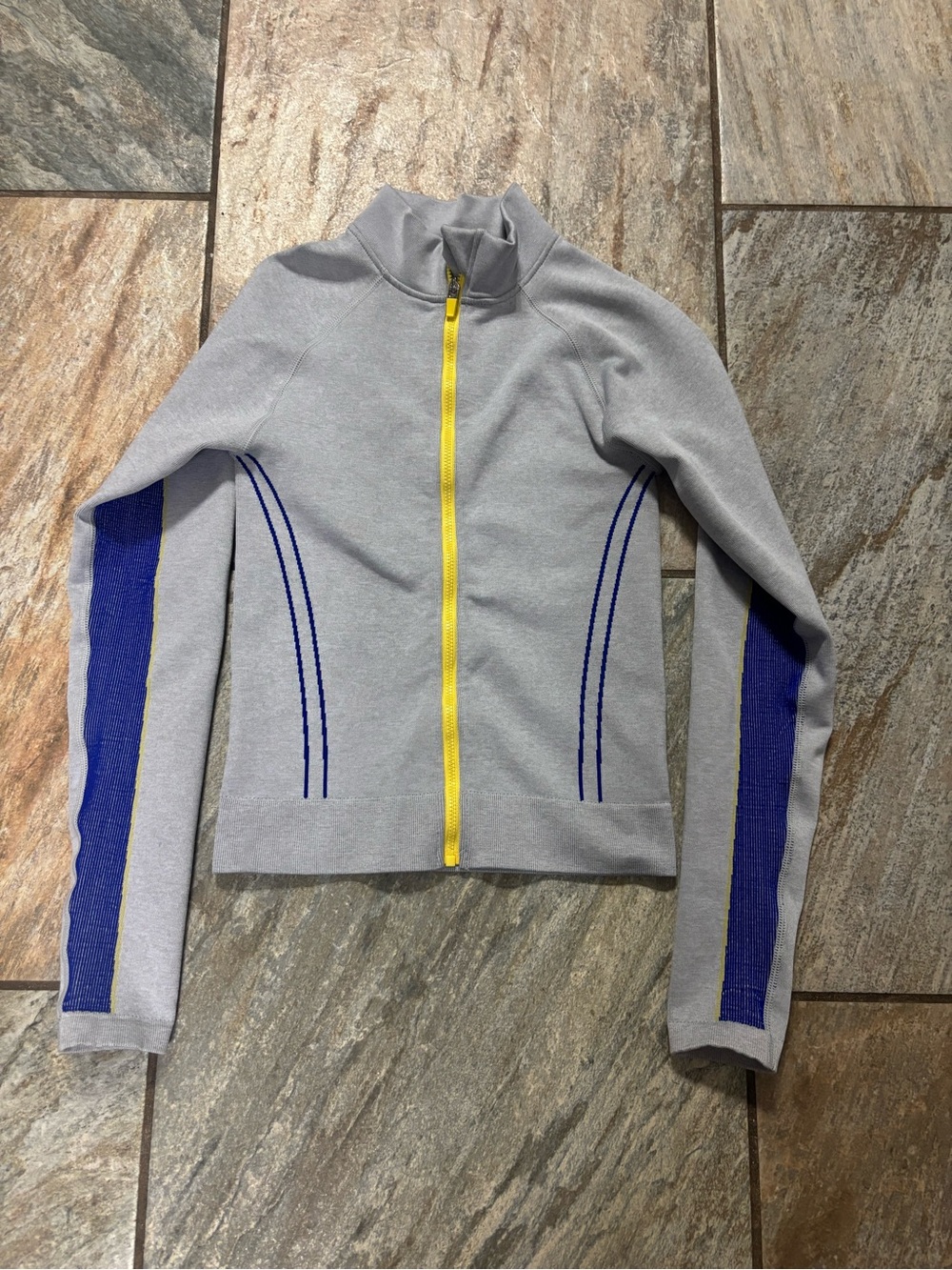 Fabletics Gray Jacket with Blue Sleeve Stripes and Yellow Zipper